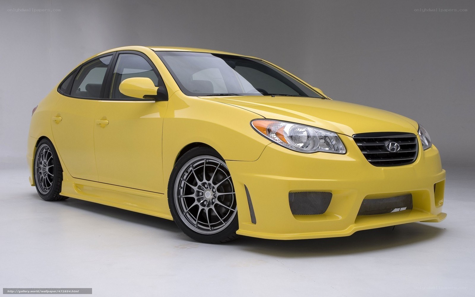 yellow hyundai sedan