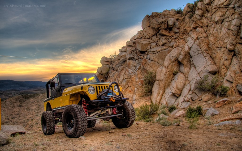 Yellow Jeep on Rocky Hill