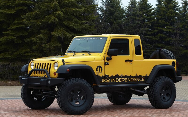 Yellow Jeep Pickup Truck