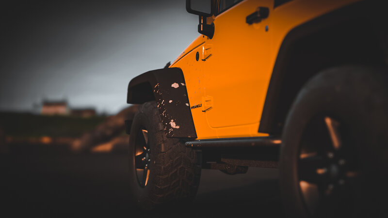 Yellow Jeep Wrangler — Dramatic, Night