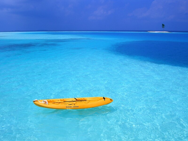 Yellow Kayak in Ocean — Blue