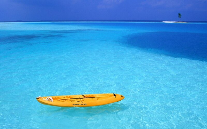 Yellow Kayak in Ocean