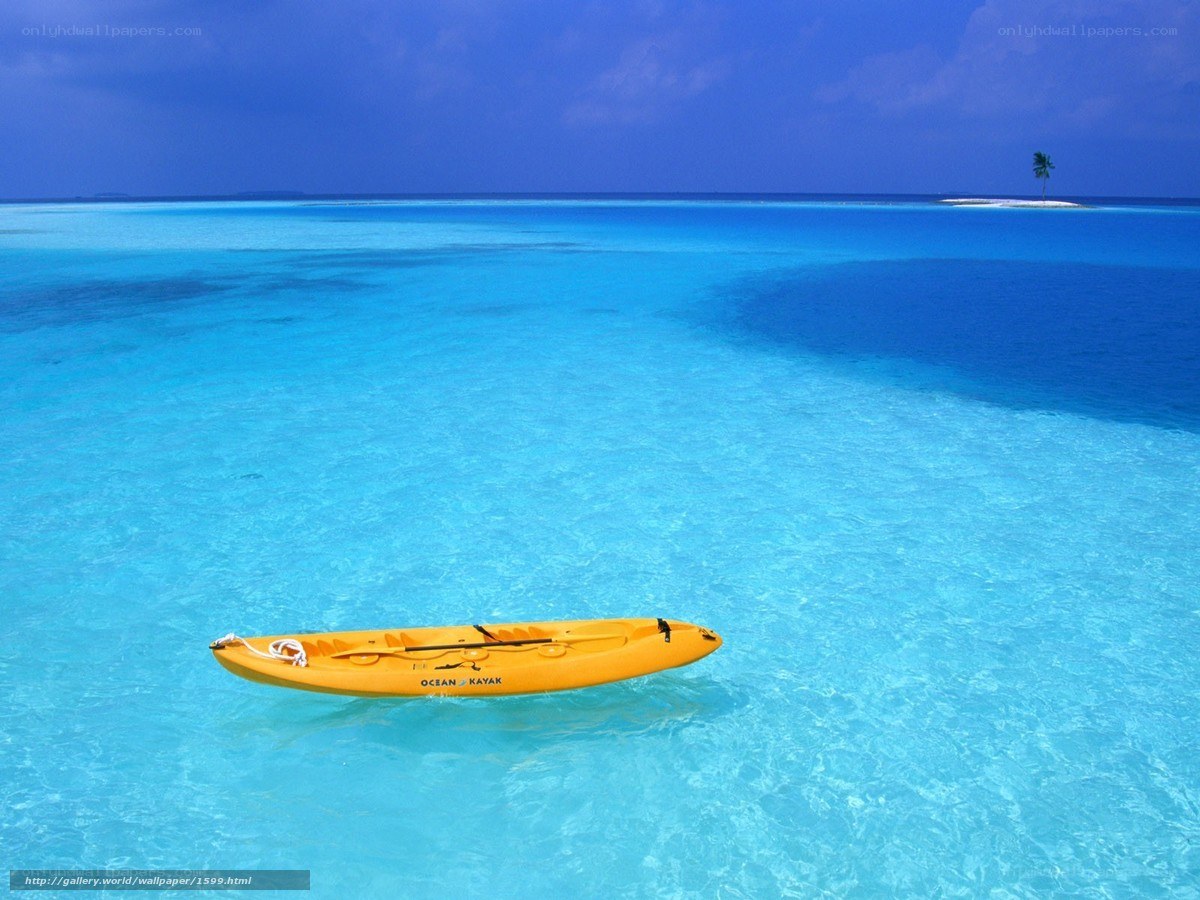 Yellow kayak in turquoise water