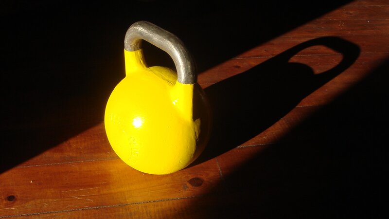 Yellow Kettlebell on Floor