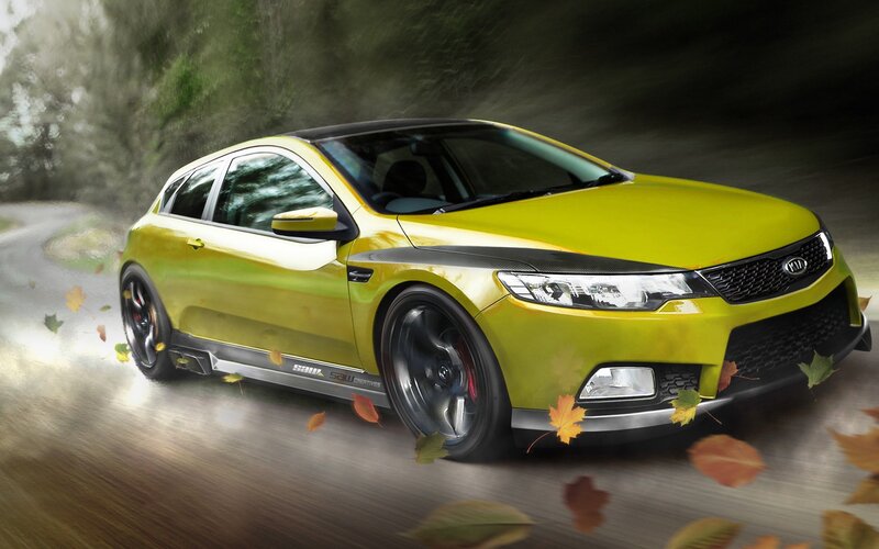 Yellow Kia in motion