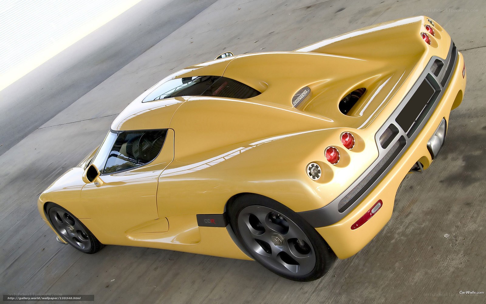 yellow koenigsegg ccr sports car