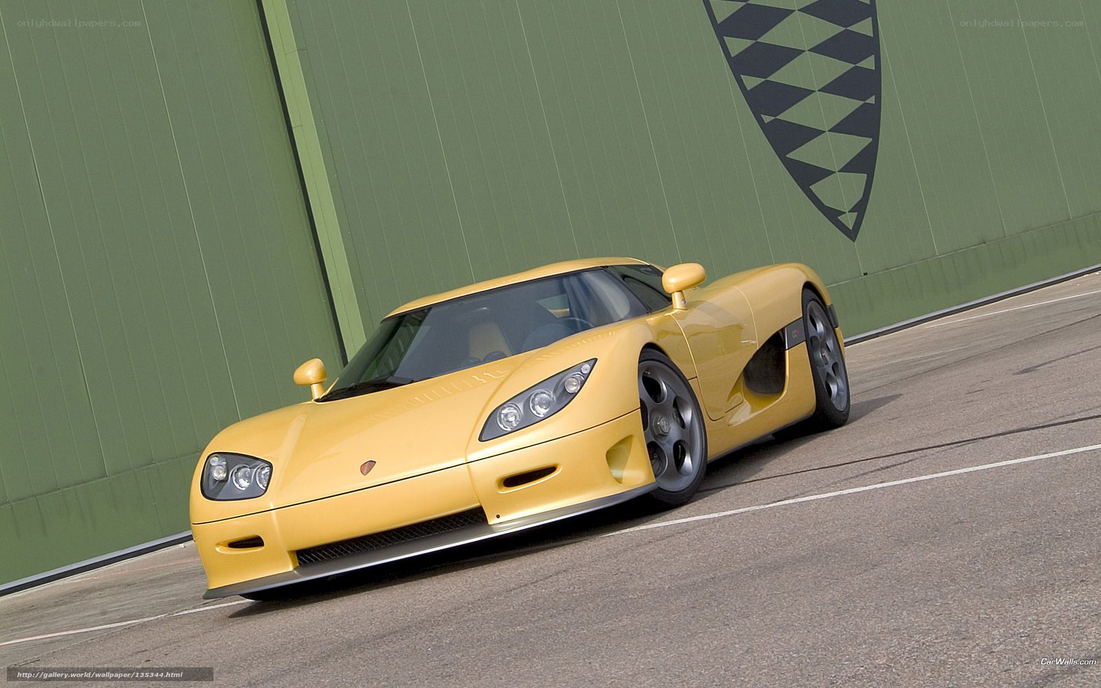 yellow Koenigsegg sports car