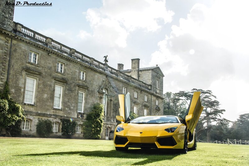 Yellow Lamborghini at a stately home