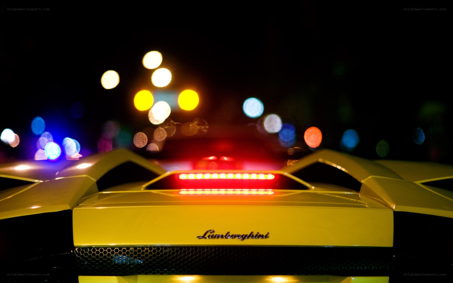 Yellow Lamborghini at night