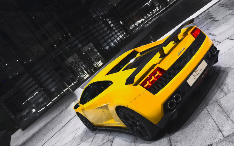 yellow lamborghini at night
