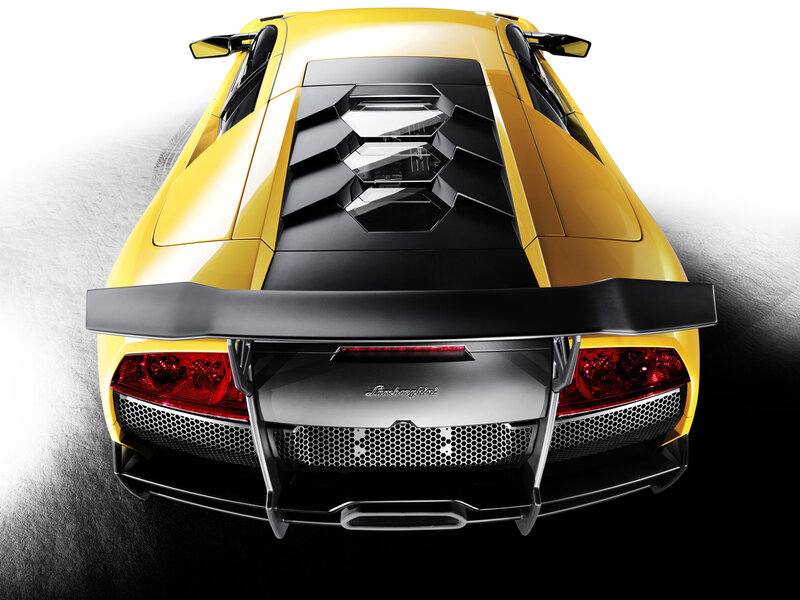 Yellow Lamborghini Car — Dramatic, Photograph, Rear Wing, Taillights, Exhaust