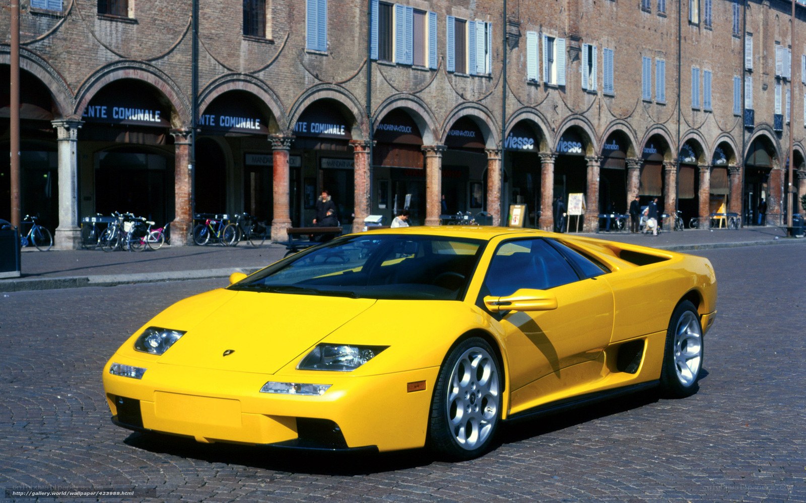 Yellow Lamborghini Diablo on cobblestones