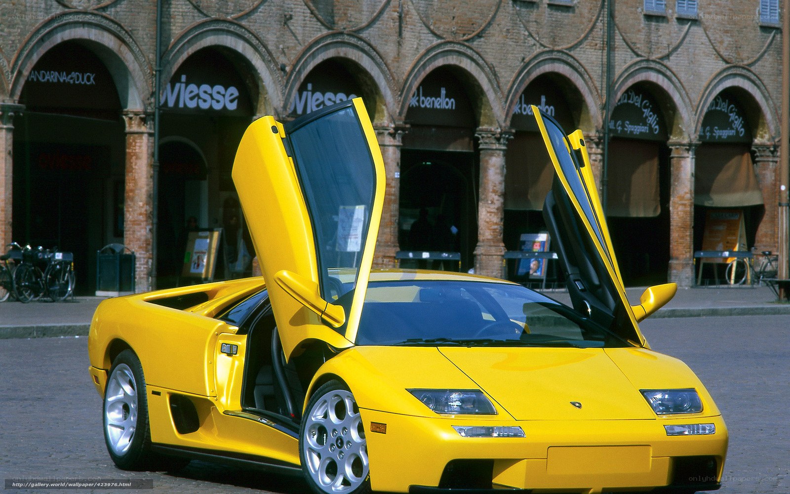 Yellow Lamborghini Diablo with doors open