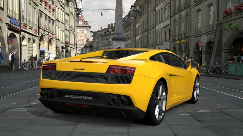 Yellow Lamborghini Gallardo on city street