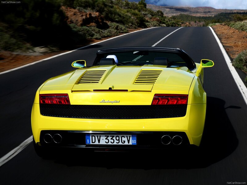 Yellow Lamborghini Gallardo on road