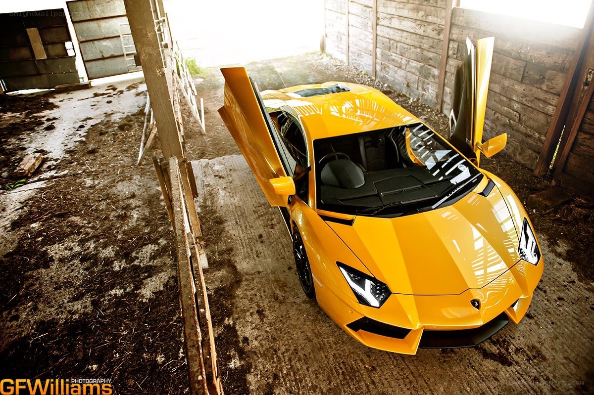 Yellow Lamborghini in barn