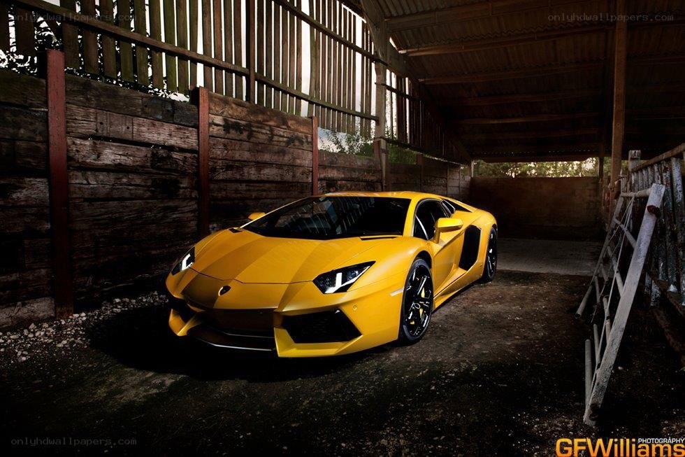 Yellow Lamborghini in barn
