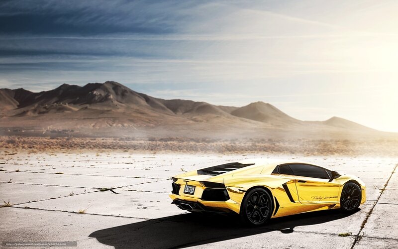 Yellow Lamborghini in desert