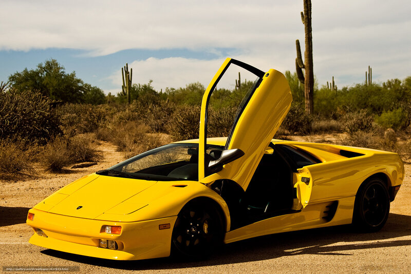 Yellow Lamborghini in desert