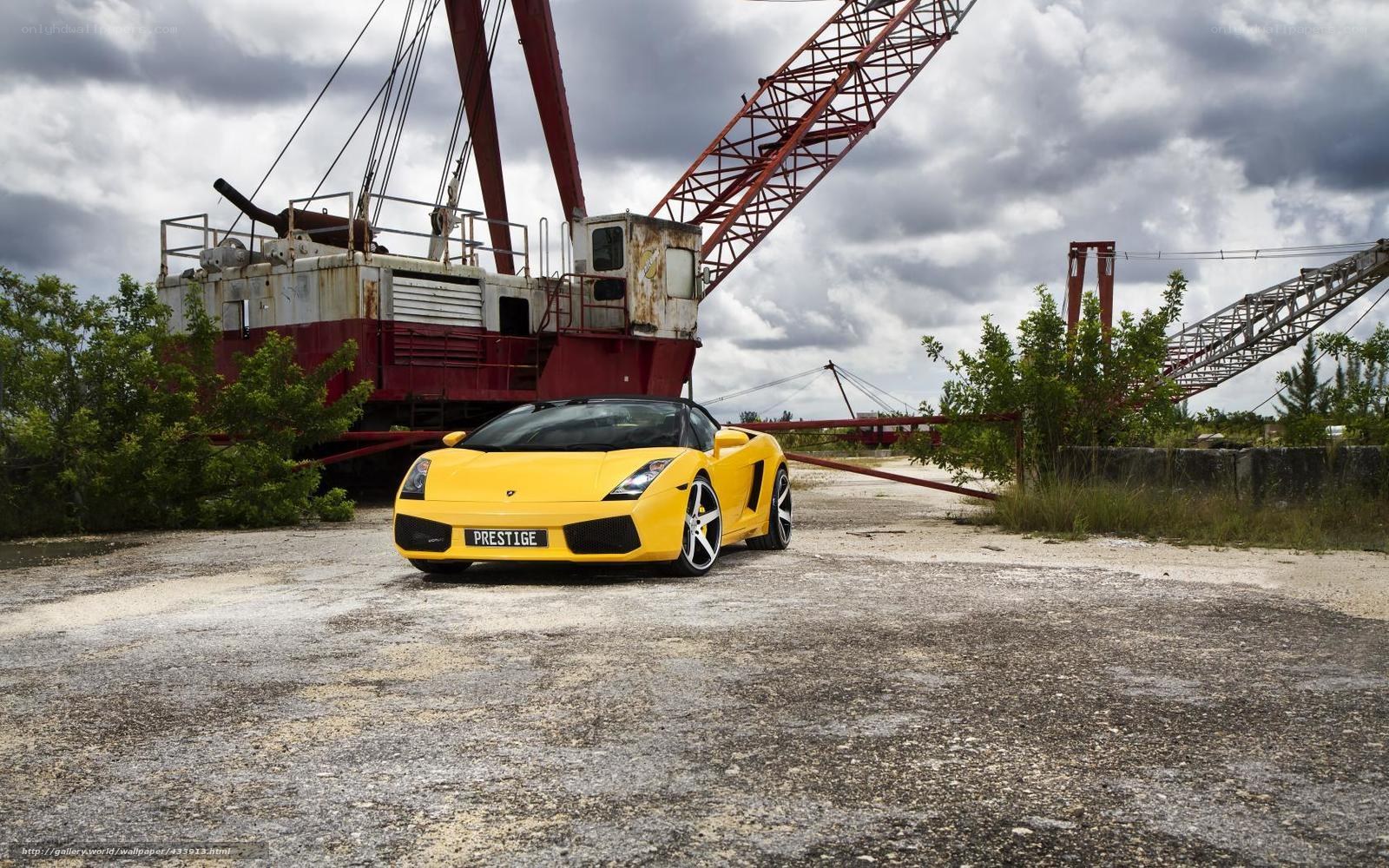 Yellow Lamborghini in industrial setting