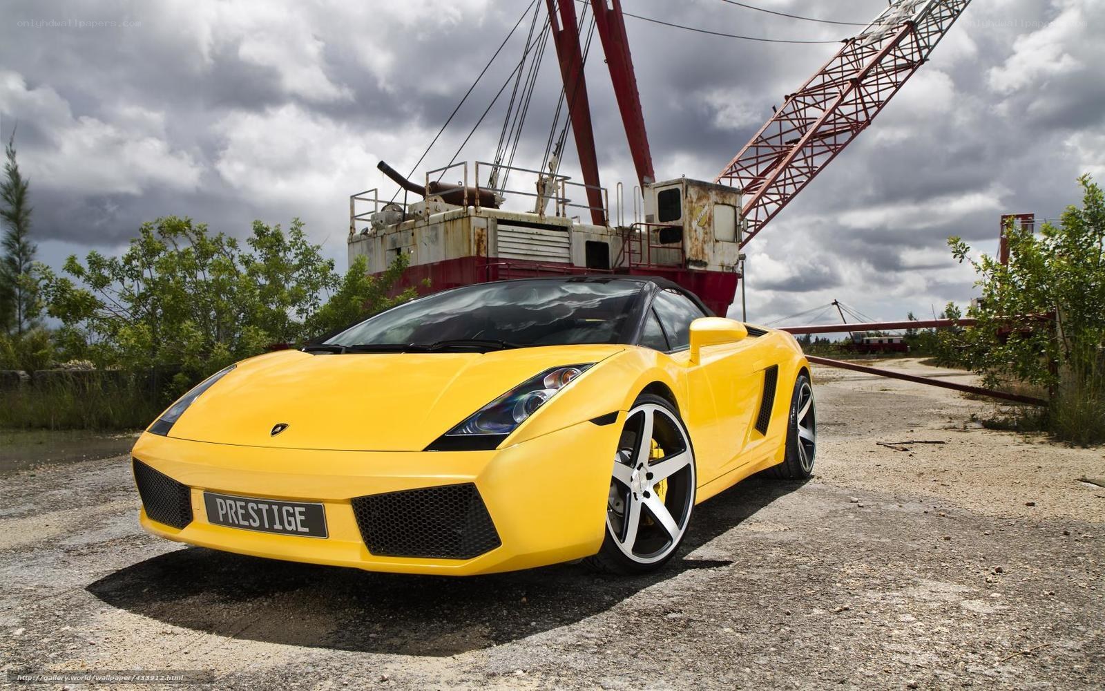 Yellow Lamborghini in industrial setting