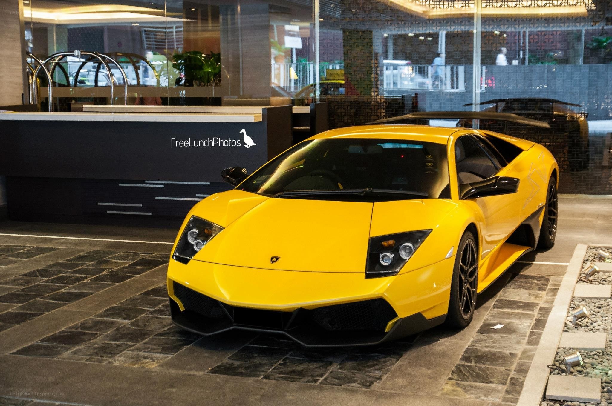 Yellow Lamborghini in lobby