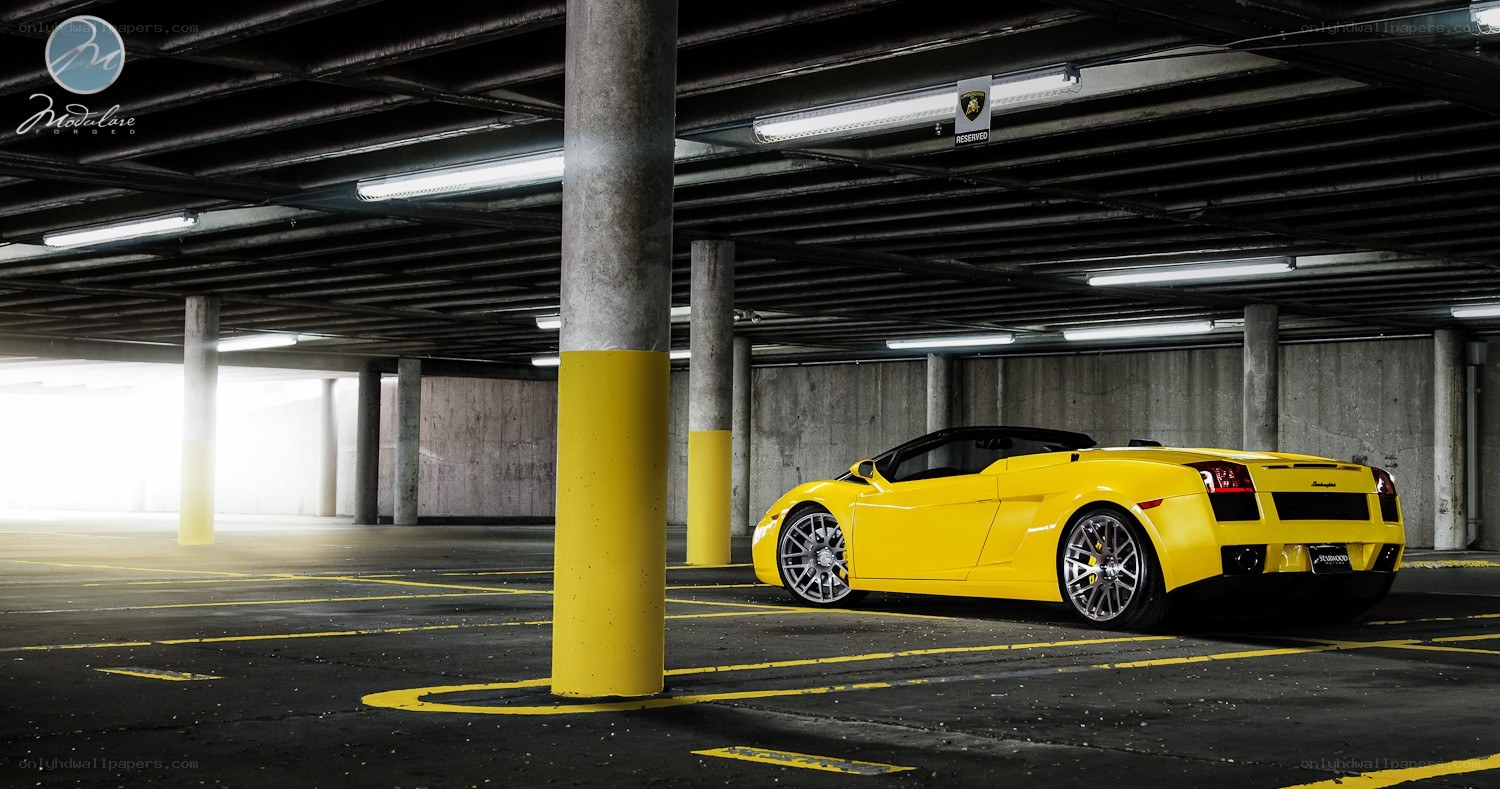 Yellow Lamborghini in parking garage