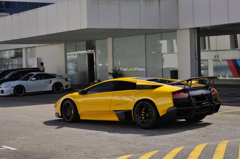Yellow Lamborghini in parking lot