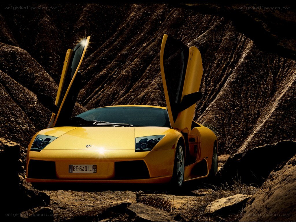 Yellow Lamborghini in rocky terrain
