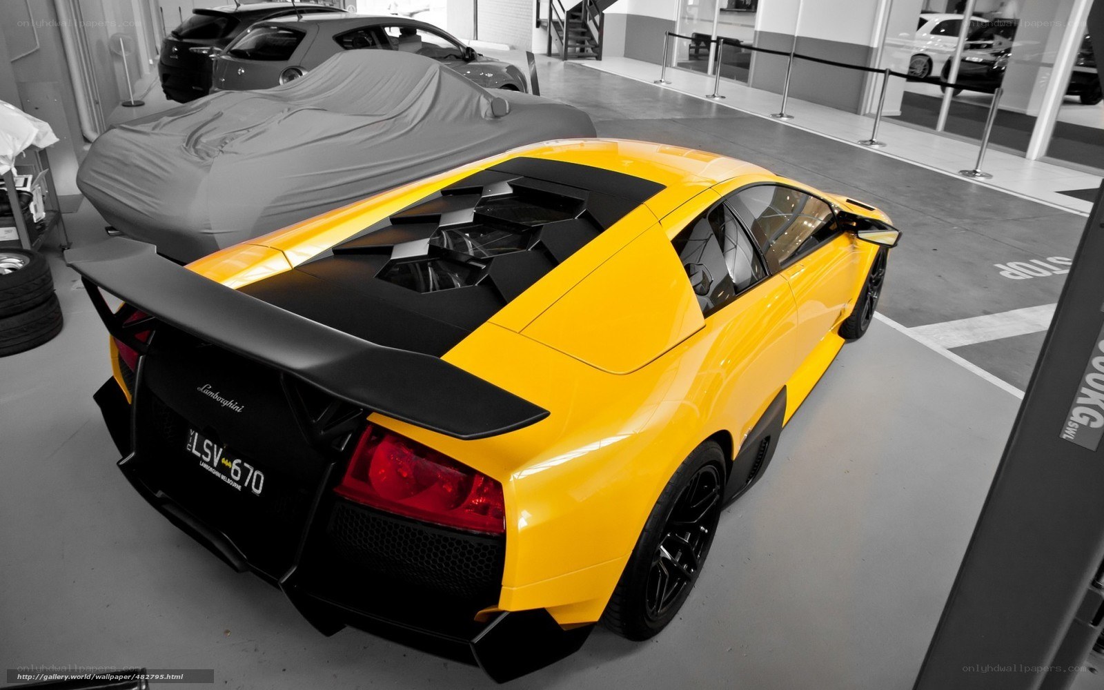 Yellow Lamborghini in showroom