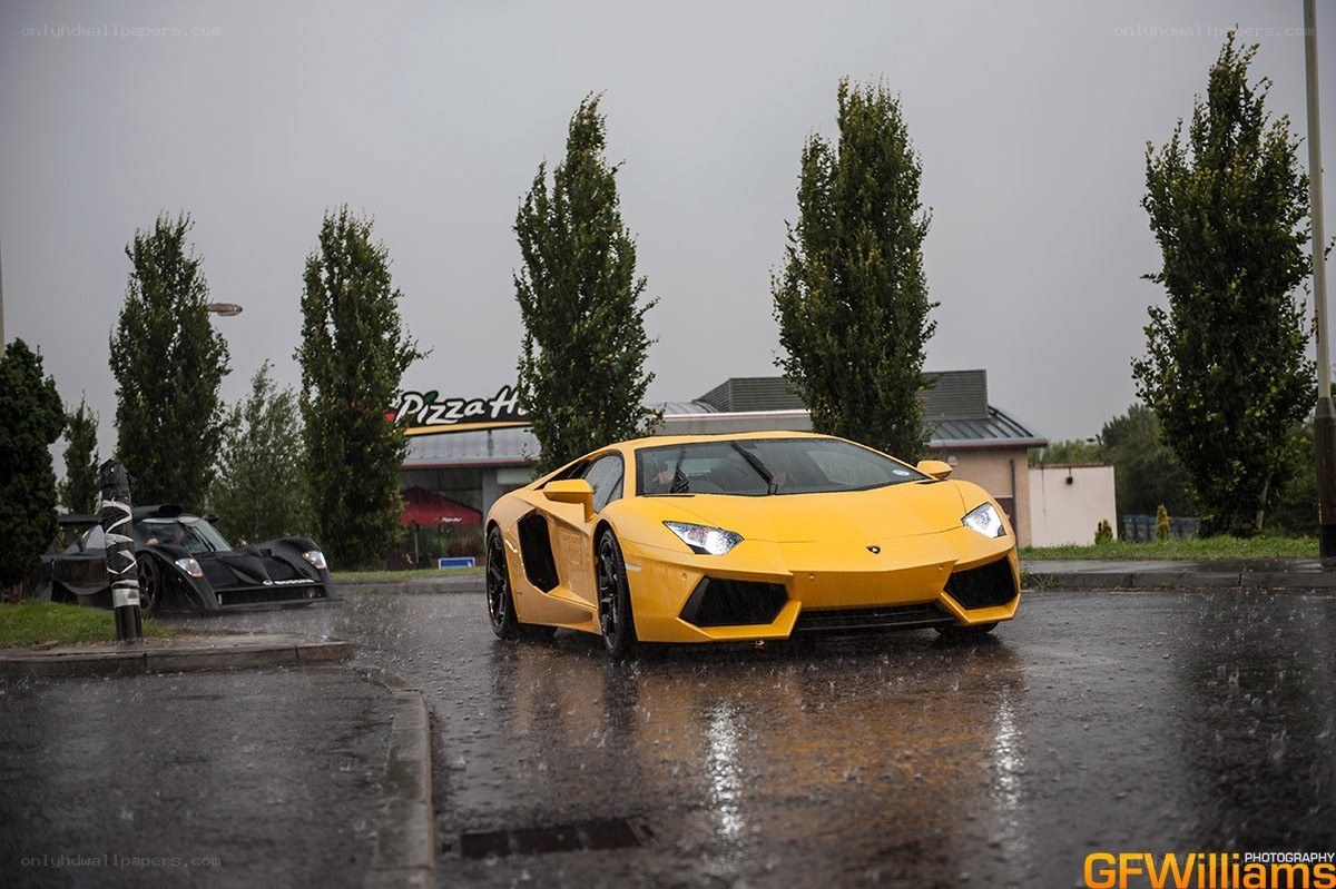 Yellow Lamborghini in the rain
