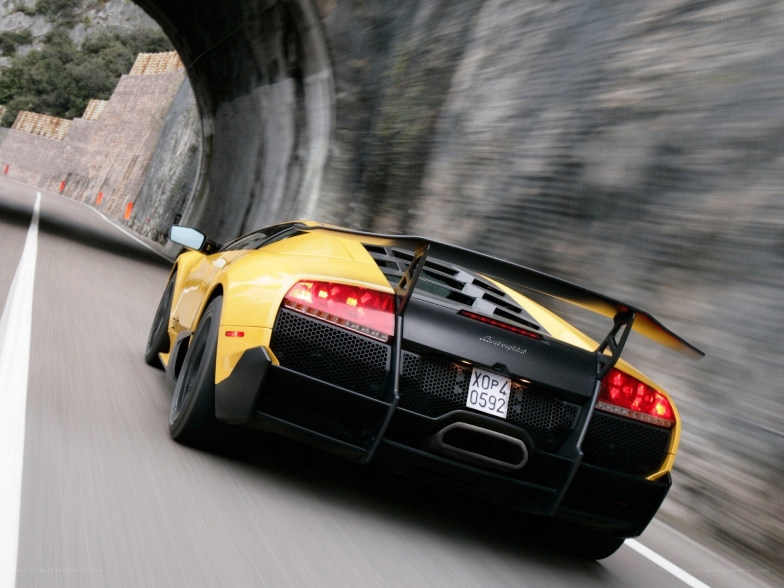 Yellow Lamborghini in tunnel
