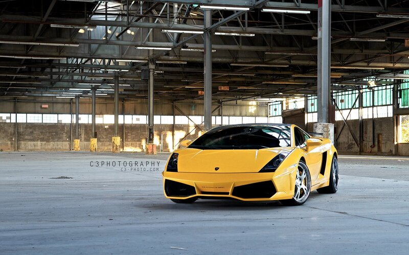 Yellow Lamborghini in warehouse