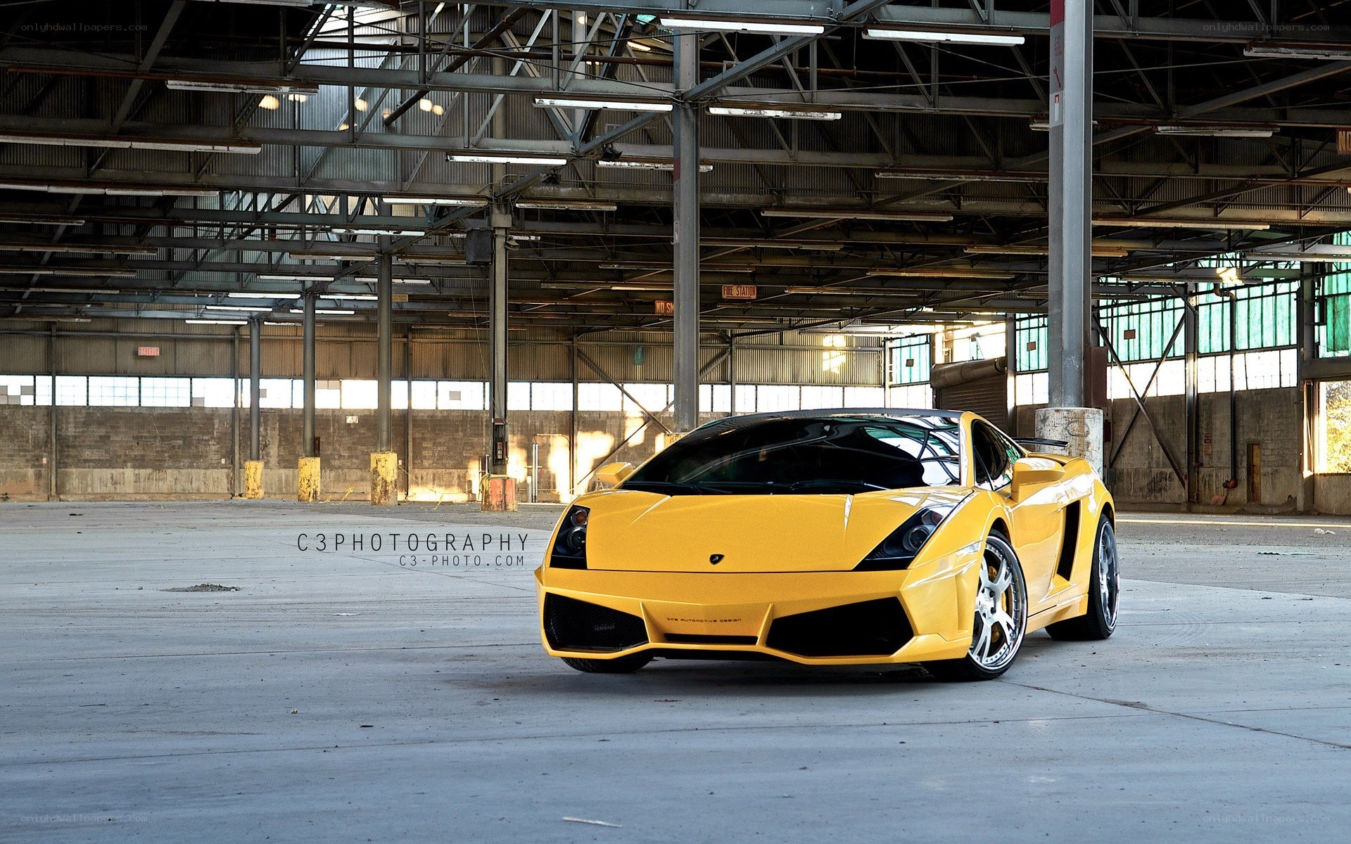 Yellow Lamborghini in warehouse