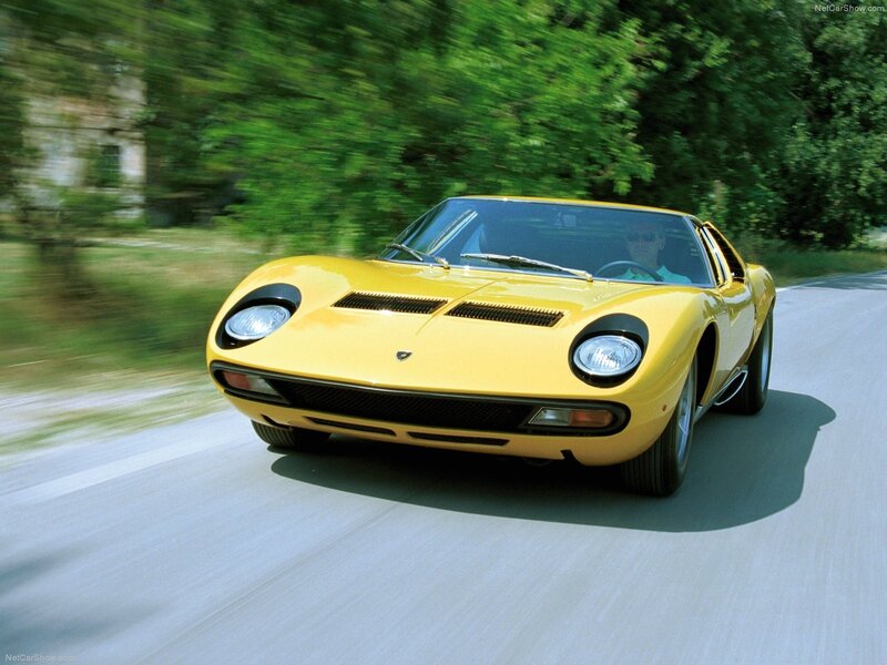Yellow Lamborghini Miura in motion