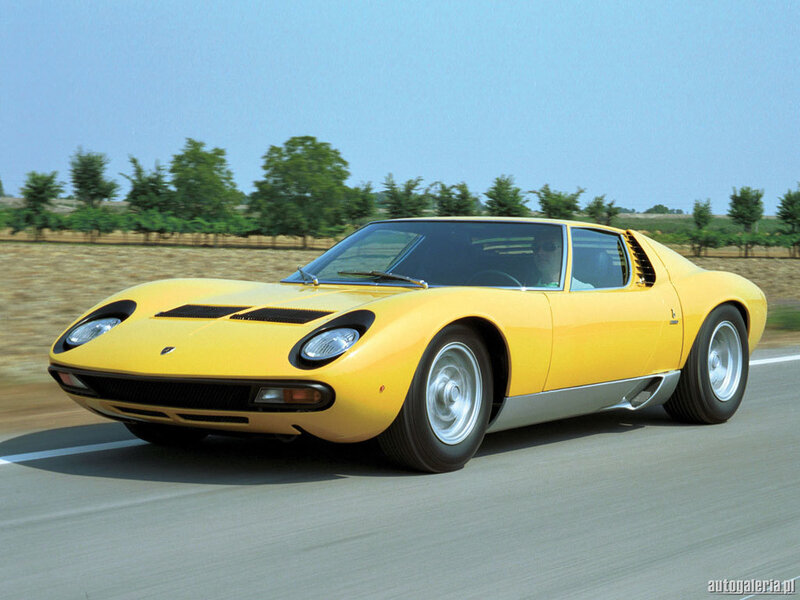 Yellow Lamborghini Miura in motion