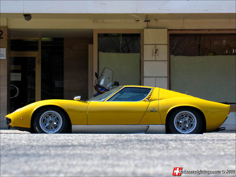 Yellow Lamborghini Miura parked