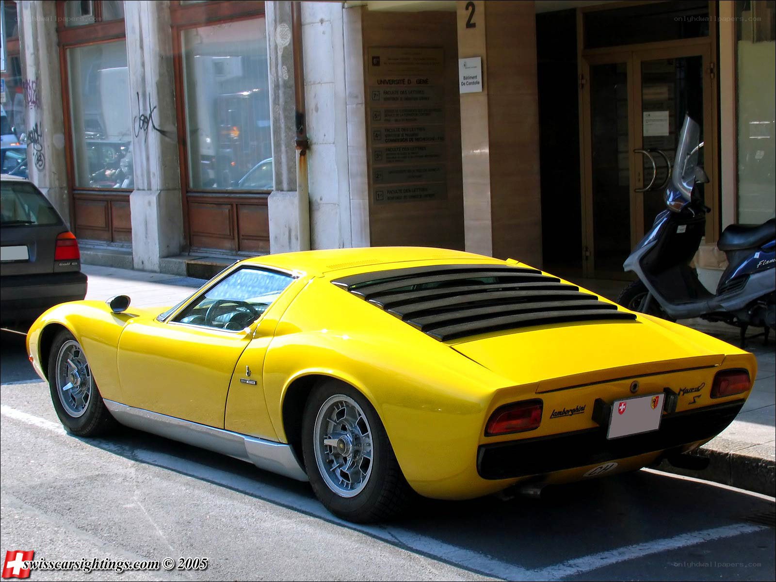 Yellow Lamborghini Miura parked