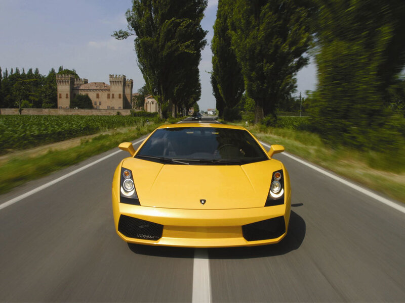 Yellow Lamborghini on a country road