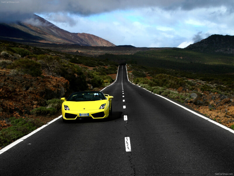 Yellow Lamborghini on a mountain road