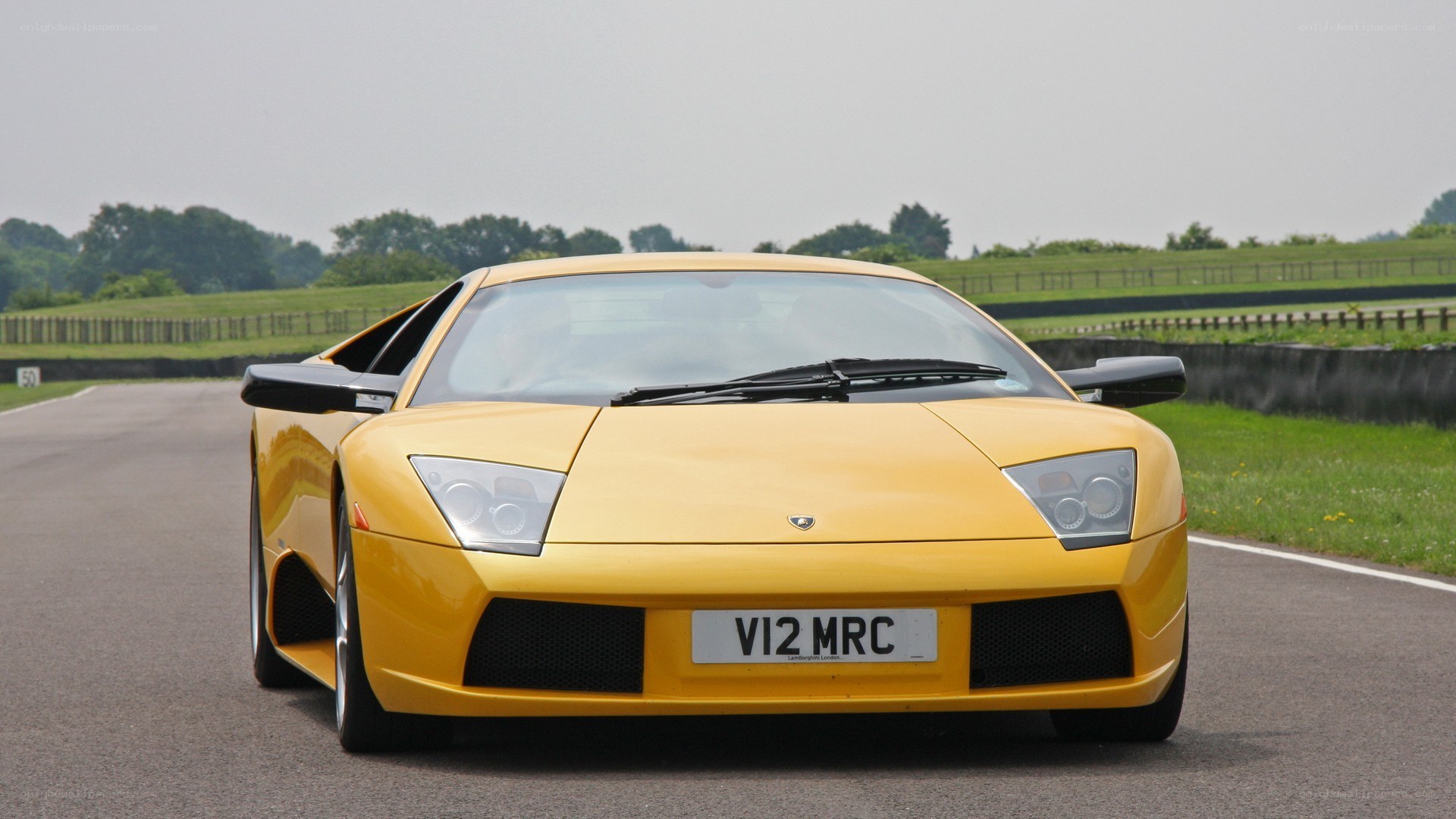 Yellow Lamborghini on a racetrack