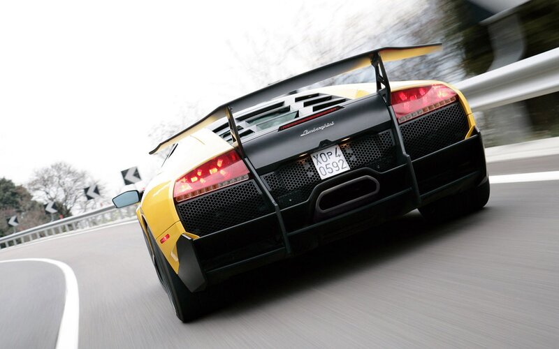Yellow Lamborghini on a road