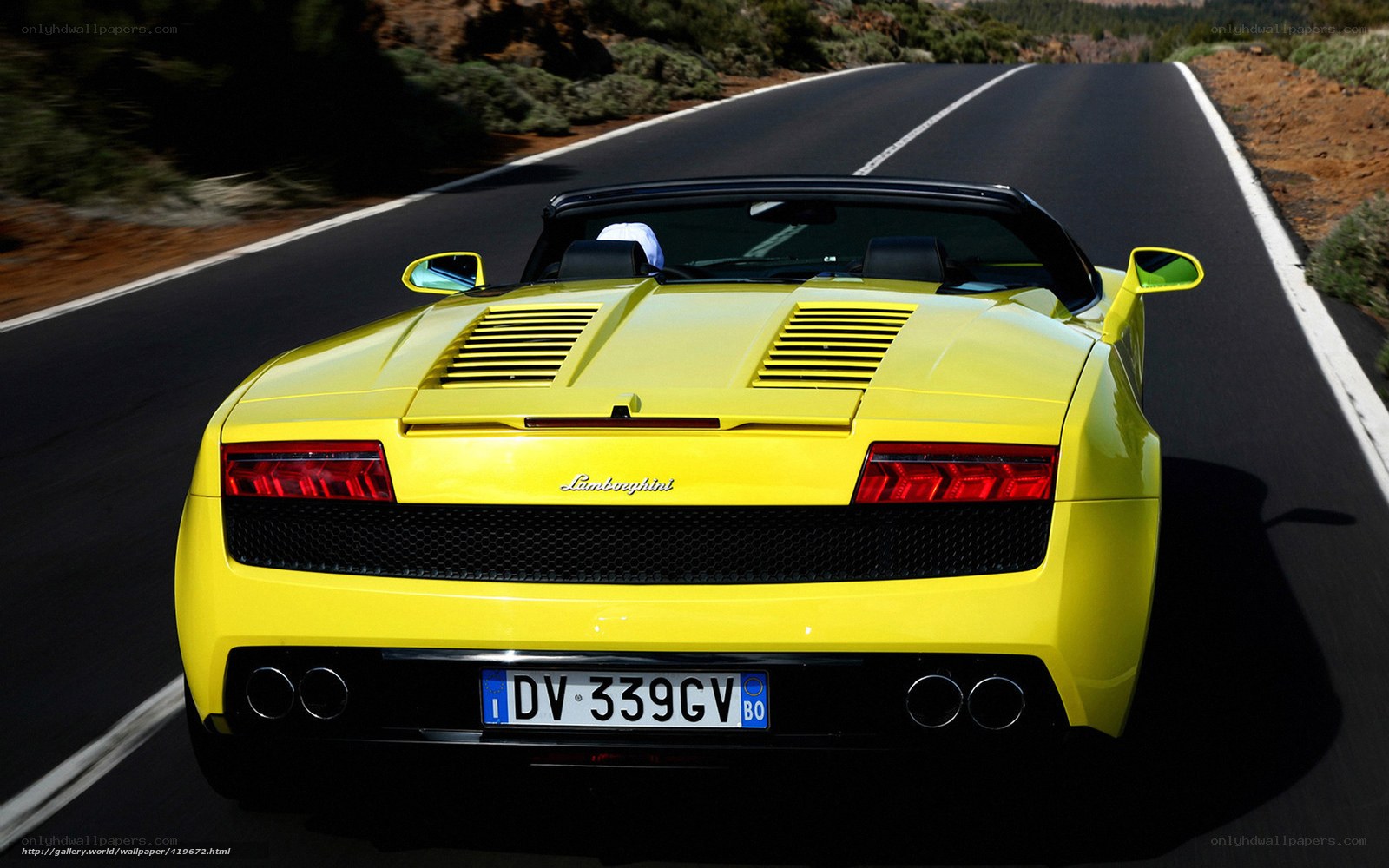 Yellow Lamborghini on a road