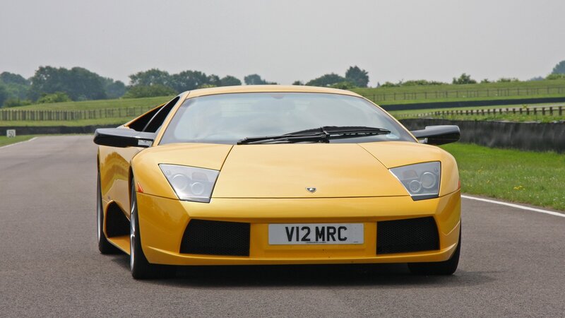 yellow lamborghini on a track