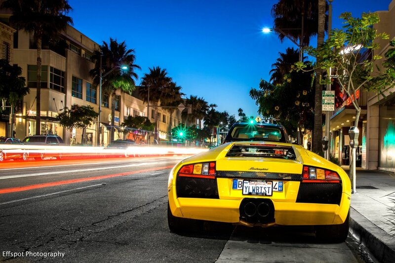 Yellow Lamborghini on city street