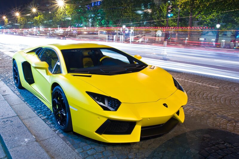 Yellow Lamborghini on city street