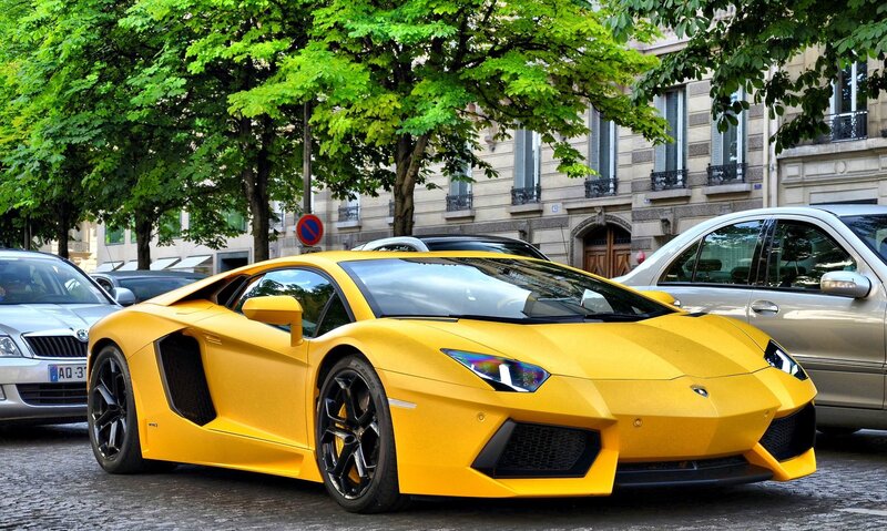 Yellow Lamborghini on city street