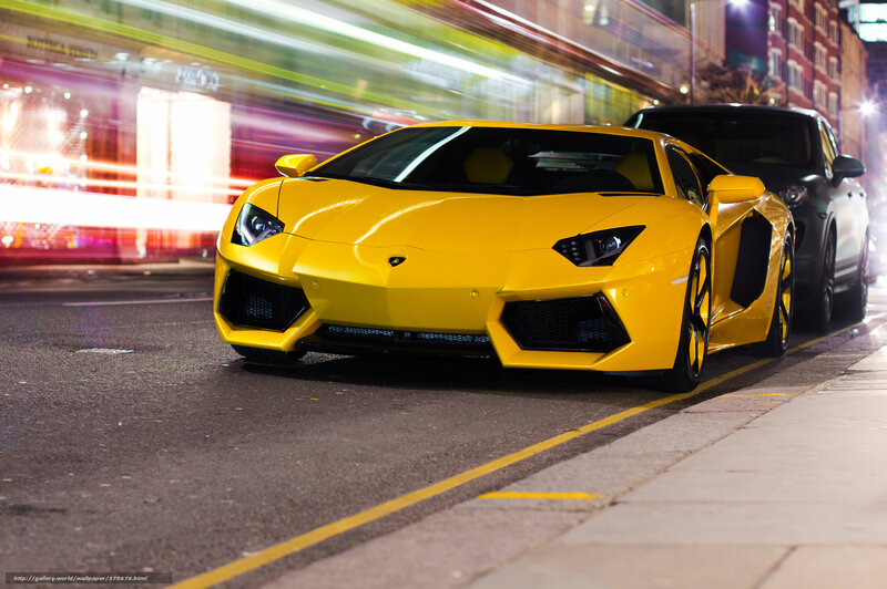 Yellow Lamborghini on city street