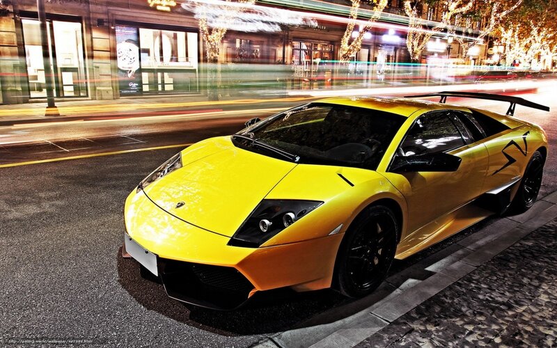 Yellow Lamborghini on city street