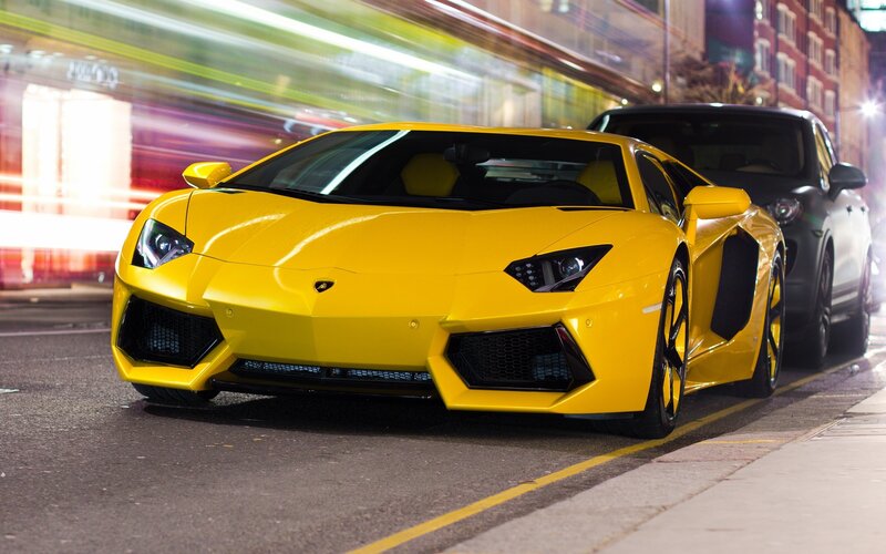 Yellow Lamborghini on city street